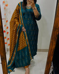 Premium Ajrak Cotton Suit Set – Teal & Mustard Ikat Print | Kurti, Pant & Dupatta