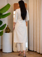 White/Cream Khadi Cotton Kurti featuring colorful floral neck embroidery
